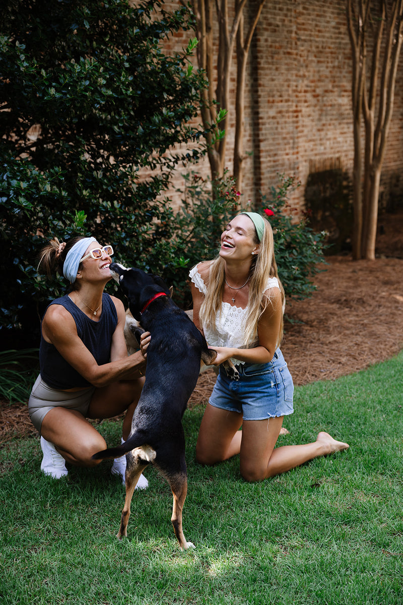 Lifestyle photo of our Organic Twist Headbands in Chambray Blue and Watercress Green #color_chambray-blue